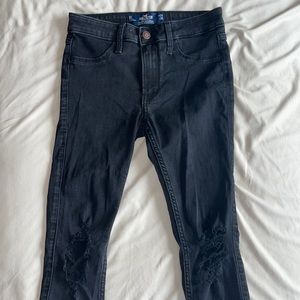 Hollister women’s size 0S Mid rise Jean Jeggings  black distressed denim